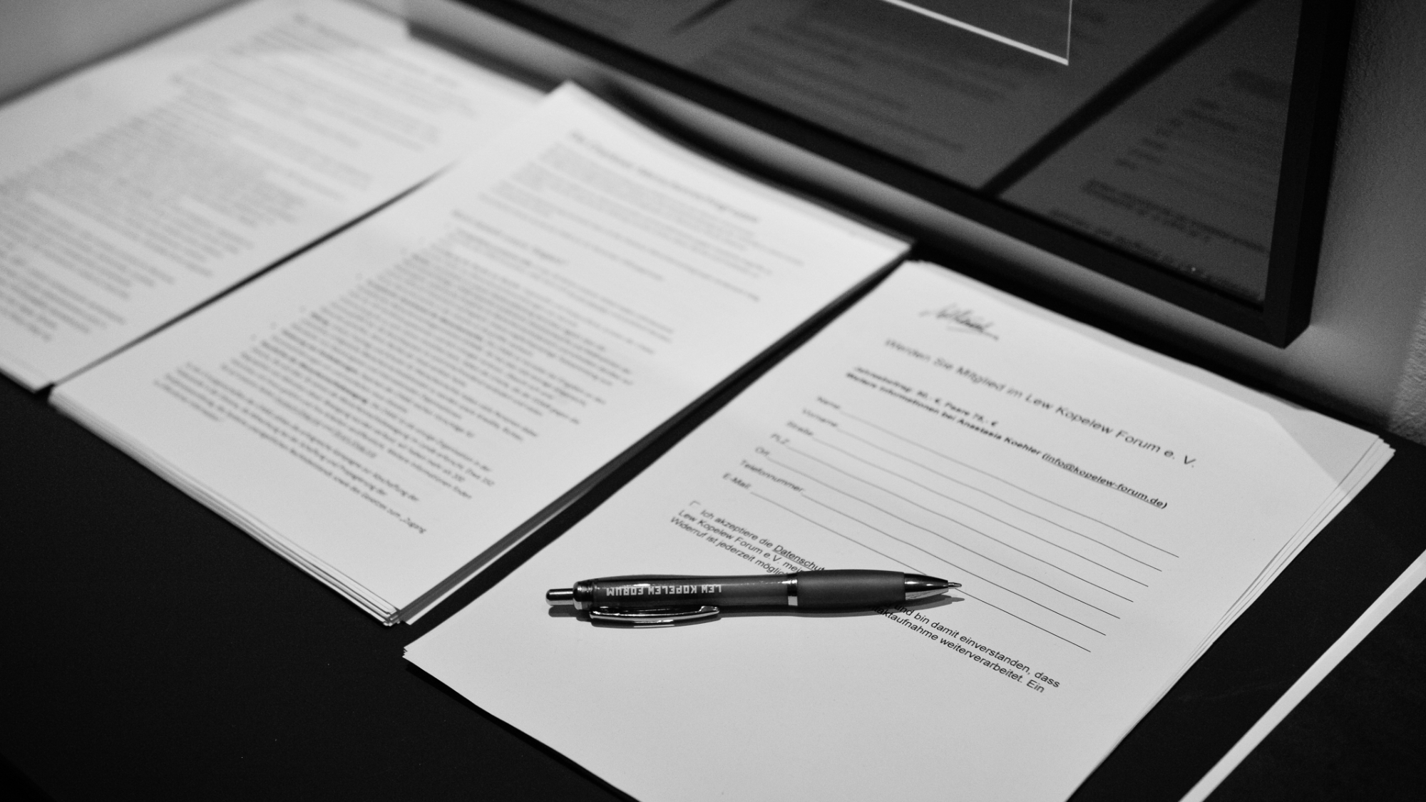 Beitrittsantrag mit Stift